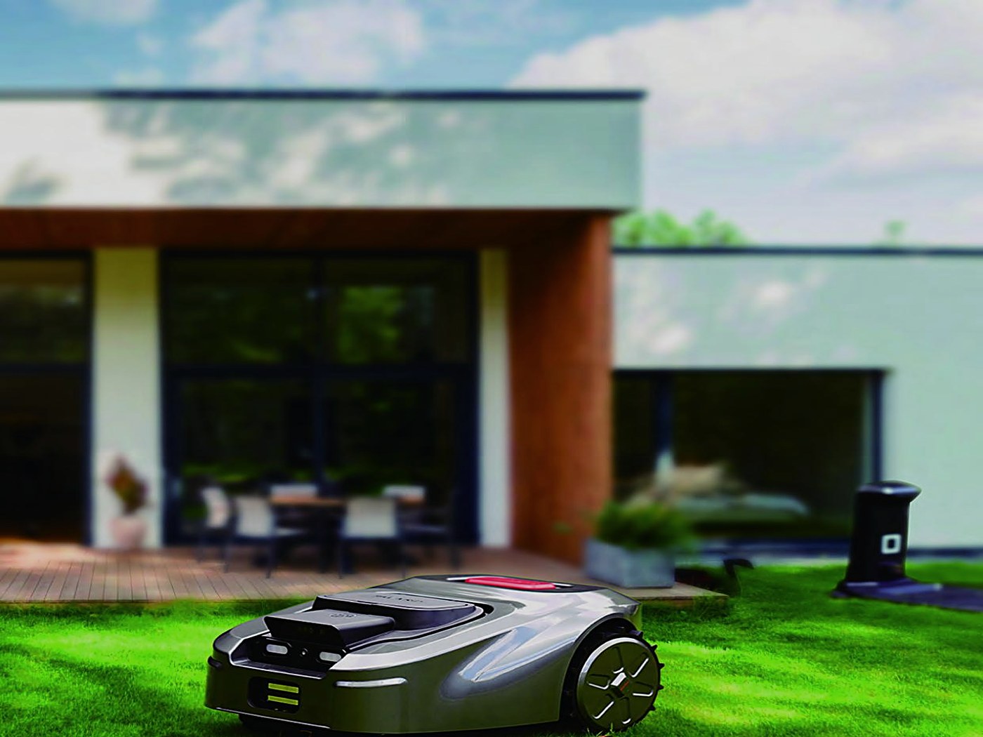 Freego GreenCut robotic lawn mower in a garden